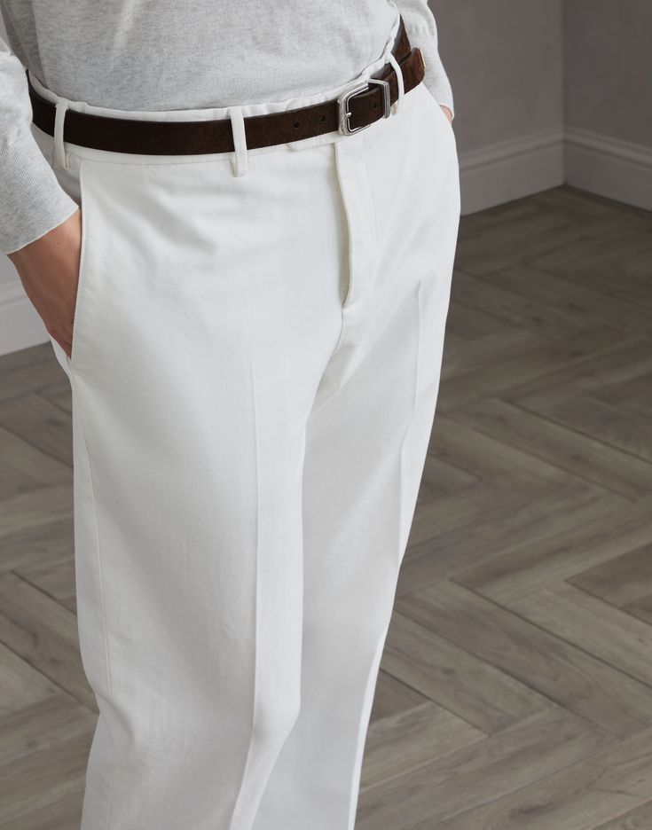 Garment-dyed Italian fit trousers in twisted cotton gabardine The casual appearance of garment-dyed twisted cotton gabardine enriches the essential and versatile style of these Italian fit pants. The fit remains close to the body, but at the same time offers slightly softer lines than more traditional fits. Solid Cotton Dress Pants With Straight Hem, Tailored Cotton Pants With Straight Hem, Tailored Cotton Dress Pants With Belt Loops, Classic Straight Fit Cotton Pants, Elegant Chino Cotton Twill Bottoms For Business Casual, Classic Ankle-length Chinos With Belt Loops, Elegant Straight Fit Cotton Bottoms, Elegant Chino Straight Leg Pants, Formal Straight Leg Cotton Chinos