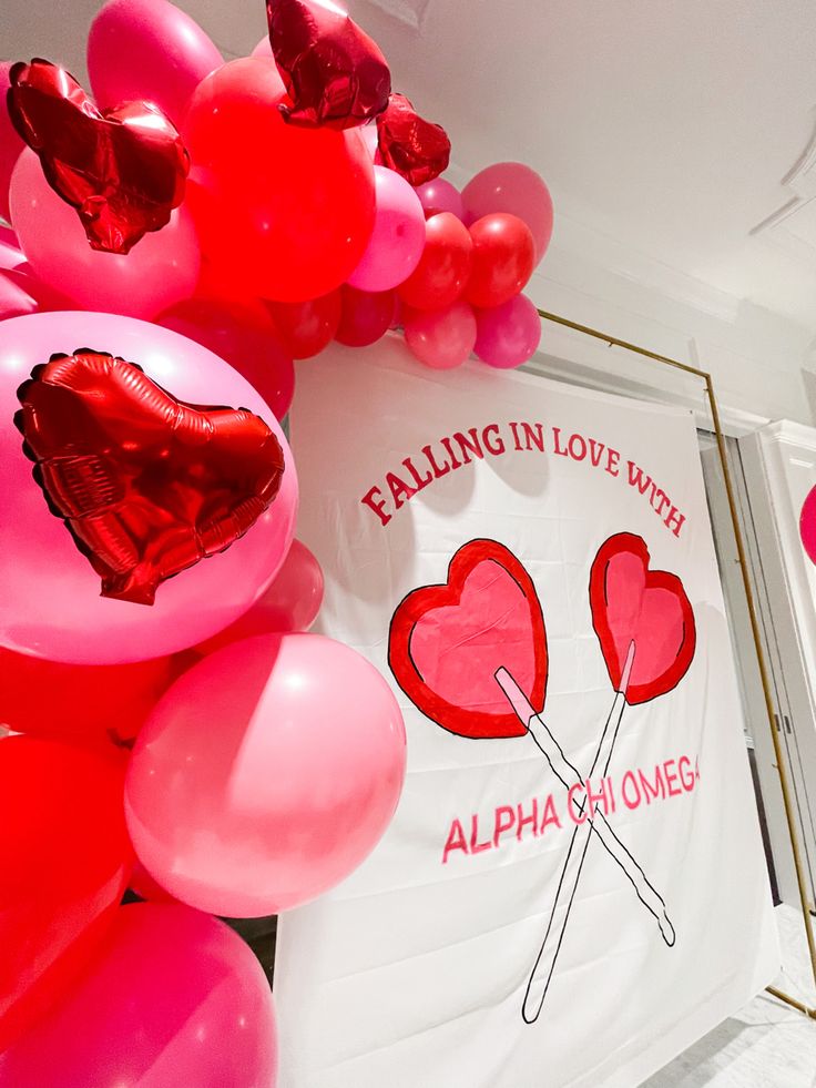 balloons are arranged in the shape of hearts