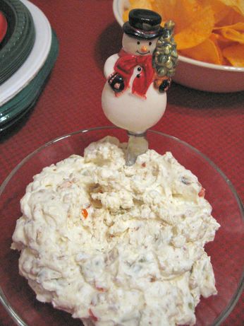 a glass bowl filled with food on top of a table