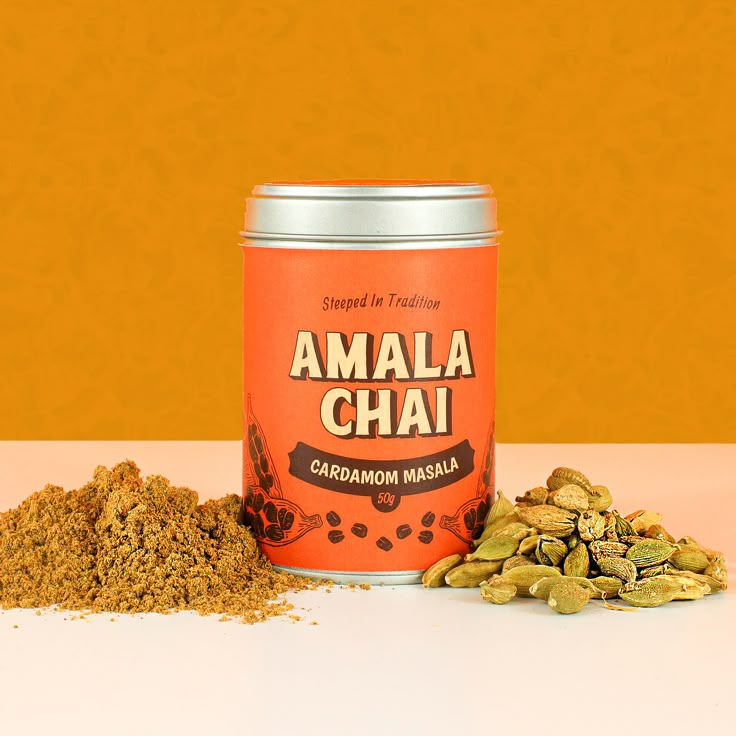 a can of amala chai next to some pumpkin seeds