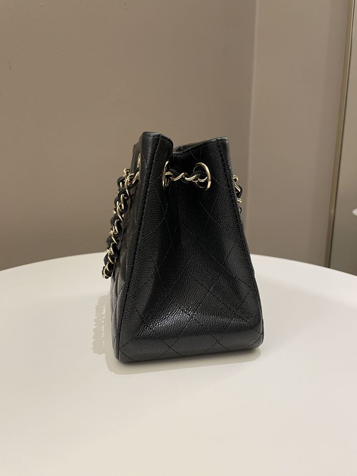 Chanel Quilted Cc Bucket BagBlack Caviar LGHWSize 16 x 15 x 4 cmSingle chain drop 51 cmMicrochipApril 20239.8/10 Like New w Seal (minor faint interior imprints otherwise like new)Includes full set box, dust bag and receiptRTP 7300 sgdPrice now 6400 sgd 4800 usd CN5495-03 Classic Office Shoulder Bag With Chain, Classic Chain Shoulder Bag For Office, Classic Bag With Chain Strap And Double Handle, Classic Formal Bags With Chain Detail, Classic Formal Shoulder Bag With Chain, Timeless Black Bag With Chain Strap, Elegant Business Bag With Chain Detail, Elegant Business Bags With Chain Detail, Classic Black Shoulder Bag With Chain