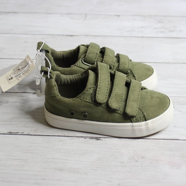 New With Tags Old Navy Olive Green Casual Shoes Toddler Boy Size 6 These Casual Sneakers Have Faux Suede Uppers With Three Hook And Loop Fasteners. They Have White Rubber Outsoles And Tan Soles. They Are Brand New With Tags However Please Know One Shoe Has A Stain. It Appears To Be Glue Residue Possibly From Manufacturing. They're Nice Quality And Have Never Been Worn. Green Slip-on Sneakers With Round Toe, School Sneakers With Soft Sole And Closed Toe, Casual Sneakers With Soft Sole And Round Toe, Soft Sole Closed Toe Sneakers For School, Closed Toe Sneakers With Soft Sole For School, Casual Sneakers With Soft Sole For School, Casual School Sneakers With Soft Sole, Casual Sneakers With Soft White Sole, Brown Slip On Shoes