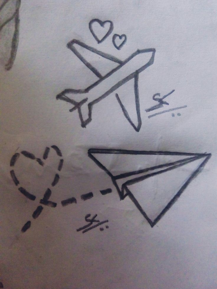 a drawing of a paper airplane and a heart