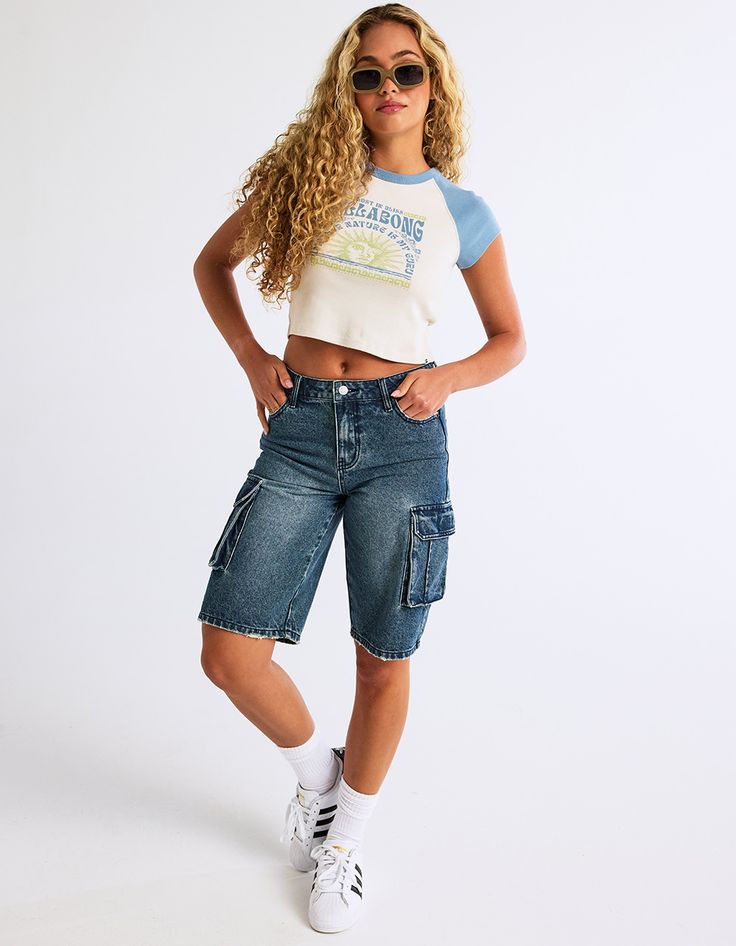 Rsq Cargo Jorts. These Versatile Shorts Combine The Relaxed Comfort Of Classic Denim Cutoffs With The Practicality Of Cargo Pockets. Zip Fly And Belt Loop Waist. Low Rise. Loose And Baggy Fit. Medium Wash. Slight Distressing At The Hem And Pockets. Approx. Inseam: 11.5''. 82% Cotton, 10% Viscose, 8% Polyester. Machine Wash. Imported. Model Is Wearing A Size 26. Model Measurements:height: 5'7" Bust: 32"waist: 24.5"hips: 36" Cargo Shorts Outfit, Womens Cargo, Wool Jackets Women, Baggy Hoodie, Linen Suits, Concert Fits, Denim Cutoffs, Women Cargos, Style Hoodie