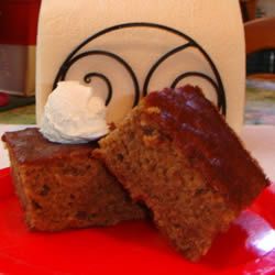 two pieces of cake sitting on top of a red plate