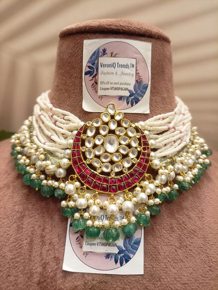 Handmade item. Brass, Glass, Stone, Onyx Beads,Pearls,Kemp Stone Polki Jewellery: What is Polki? Polki is a popular bridal jewelry characterized by a shiny appearance than Kundan. It is made of uncut/unfinished diamonds that is slightly polished without any further lab or chemical treatments or craftsmanship. For this reason, Polki is more expensive than Kundan and other families use it as heirlooms. But it is less expensive than the diamond and as thus many people who cannot afford to have diamond opt for the Polki jewelry. Polki is highly valued and on high demand in Indian culture. This type of jewelry was introduced by Mughals in India. When making Polki, its precious diamond stones are set on a 24 carat gold using lac and fine gold foils. These gold foils have been painted to place th Luxury Beaded Kundan Choker Necklace, Festive Kundan Beaded Choker, Festival Kundan Pearl Pendant Necklace, Traditional Red Gold-plated Kundan Necklace, Festive Gold-plated Kundan Choker Necklace, Etsy Marketplace, Kundan Necklaces, Polki Jewellery, Moon Shapes