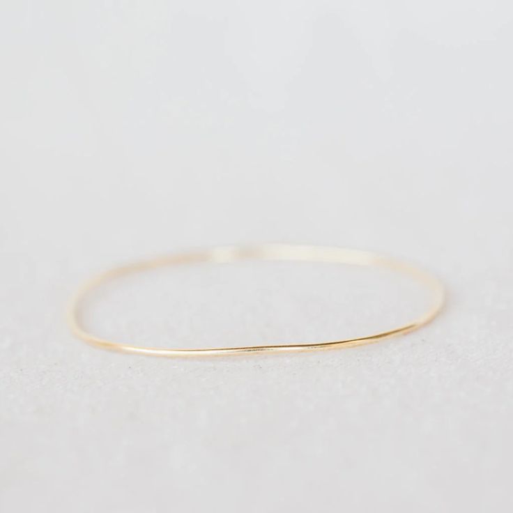 Solid gold bangle. Looks beautiful stacked with other bracelets or simply worn solo.Length: 7.5" Solid Gold Bangle, Simple Bangle, Accessories Gold, Bag Icon, Gold Bangle, Instagram Icons, Arm Candy, Gold Bangles, Solid Gold