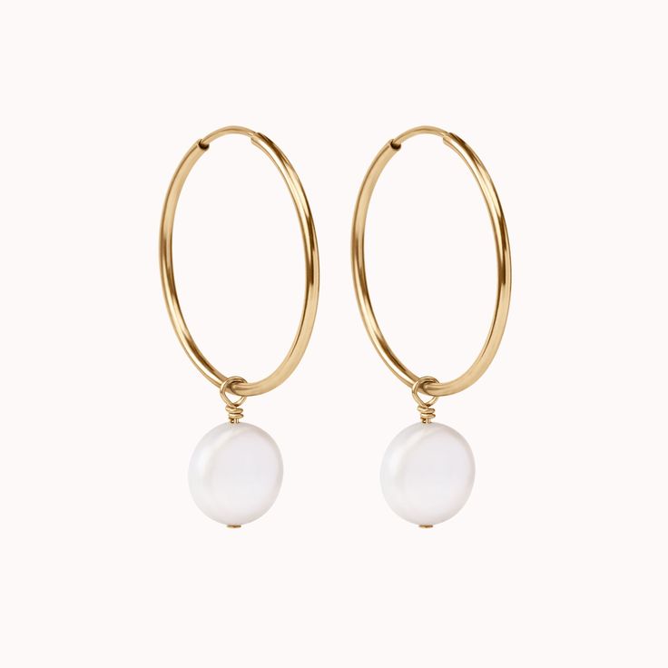 Simple and effortless enough for everyday wear, but classy enough to take you straight into the evening! Channel your inner goddess with these beautiful, freshwater pearl hoop earrings. Handcrafted in our Salt Lake City studio ✨ Everyday Pearl Hoop Earrings With Pearl Pendant, Everyday Pearl Charm Hoop Earrings, Everyday Hoop Earrings With Pearl Pendant, Minimalist Pearl Charm Hoop Earrings For Everyday, Small Pearl Hoop Earrings For Everyday, Everyday Small Pearl Hoop Earrings, Minimalist Everyday Hoop Earrings With Pearl Charm, Everyday Hoop Pearl Earrings With Ear Wire, Everyday Pearl Hoop Earrings With Ear Wire