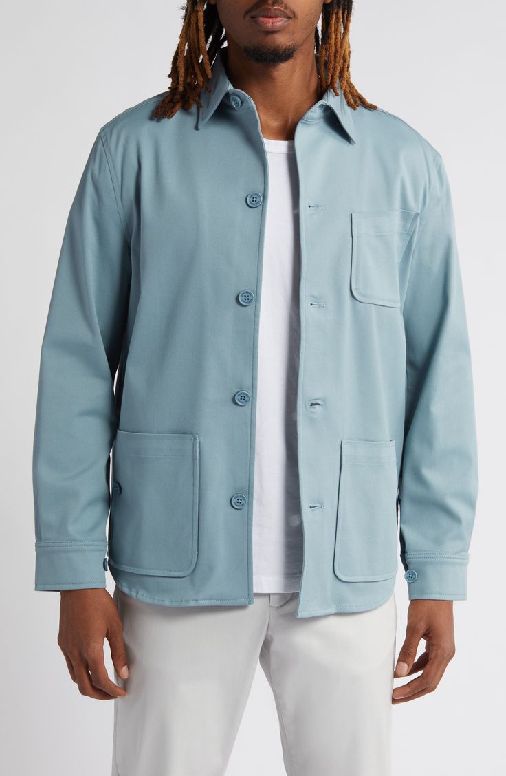 This shirt-jacket takes it up a notch or three with a lightweight cotton blend, a slanted chest pocket and dual-entry front patch pockets. 29" length; 45" chest (size Medium) Front button closure Point collar Adjustable button cuffs Chest patch pocket; front button-patch pockets Curved hem 67% cotton, 29% Tencel® lyocell, 4% elastane Tencel lyocell is a more-sustainably produced fiber made with closed-loop processing Machine wash, dry flat Made in Turkey Cotton Outerwear With Side Pockets And Long Sleeves, Solid Utility Jacket With Patch Pockets And Relaxed Fit, Casual Everyday Sport Coat With Button Closure, Spring Blue Shacket With Pockets, Unstructured Button-up Outerwear For Everyday, Blue Utility Jacket With Buttoned Pockets, Blue Outerwear With Pockets And Relaxed Fit, Everyday Long Sleeve Single Breasted Utility Jacket, Classic Blue Outerwear For Everyday