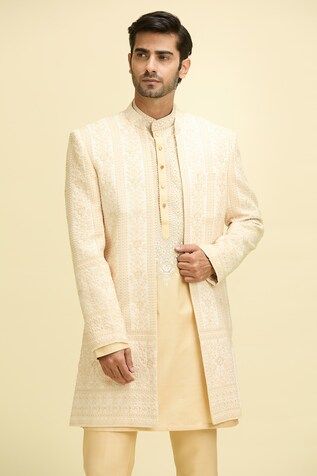 Beige full sleeves longline front open bundi with Gul bloom vine embroidery. Paired with a full sleeves embroidered yoke kurta and a pant. - Aza Fashions Long Sleeve Kurta With Naqshi For Reception, Traditional Fit Long Sleeve Sherwani With Chikankari Embroidery, Long Sleeve Sherwani With Cutdana For Reception, Reception Sherwani With Cutdana And Long Sleeves, Bandhgala With Naqshi For Reception, Long Sleeve Kurta For Reception, Long Sleeve Nehru Jacket With Intricate Embroidery For Reception, Long Sleeve Embroidered Nehru Jacket For Reception, Embroidered Long Sleeve Nehru Jacket For Reception