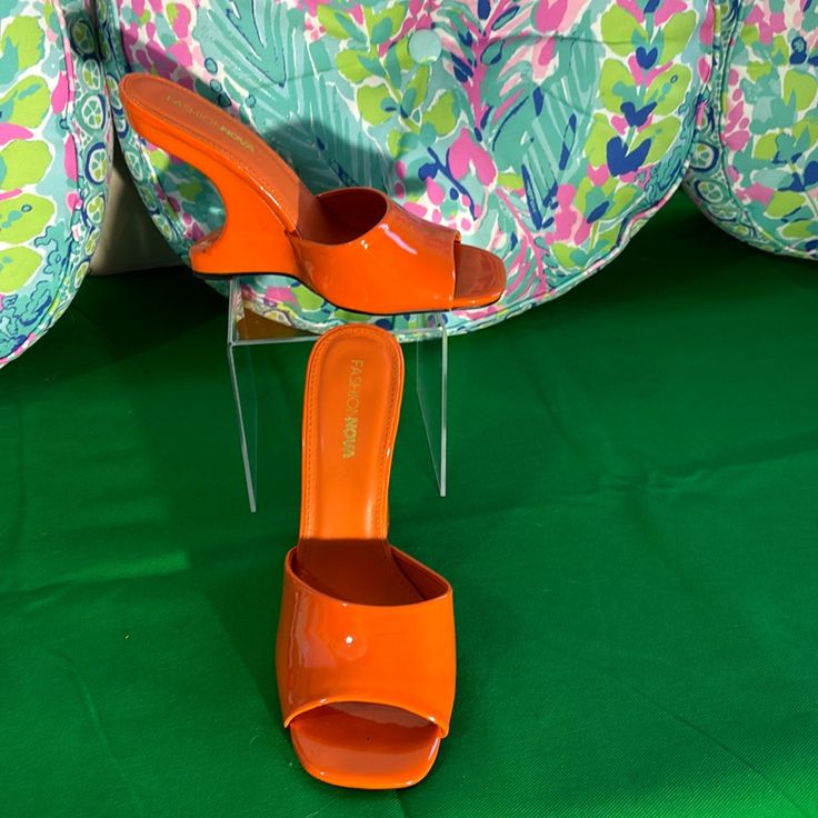 Excellent New Without Tags Condition. Features: Heels 5 Peep Toes Bright Orange All Measurements Are Taken Flat Not Stretched, In Inches And Approximate. Listing Price Is Based On A Single Sale. Bundle 3 Or More For An Automatic 25% Discount. I’ll Drop The Price So You Can Get $4.99 Discount Shipping From Poshmark On “Closet Clear Out” Dates. Trendy 4-inch Summer Heels, Summer Patent Leather Heels With Padded Heel, Trendy Open Toe Mules With 4-inch Heel, Modern Patent Leather Wedge Sandals For Summer, Spring Open Toe Wedge Sandals, Trendy Slip-on Heels With Heel Strap, Casual Summer Heels With 4-inch Heel, Trendy Patent Leather Heels For Spring, Trendy Spring Patent Leather Heels