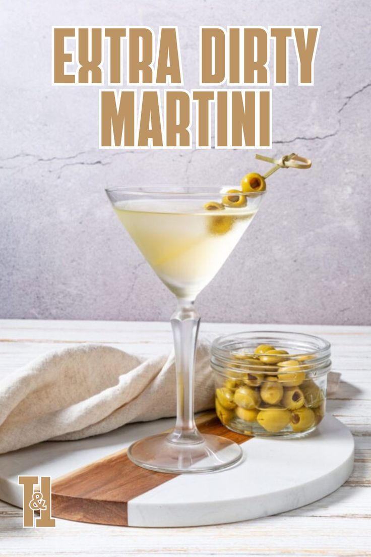 an extra dirty martini with olives on the side and text overlay that reads extra dirty martini