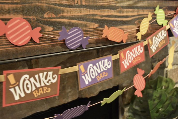 there are many signs hanging on the wall above the fire place that says wonka's barbeque