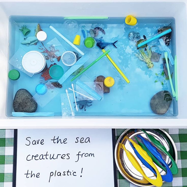 a plastic tray filled with different types of crafting supplies and writing on the side