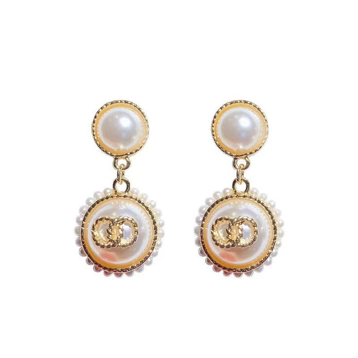 Look elegant and glamorous with these Graceful Glamour Pearl Earrings! These earrings put the “glam” in glamourous! Shine bright with these exquisite earrings and get ready to be the belle of the ball! These earrings feature pearl studs, gold detailing, small pearls circling larger pearl dangles, and a secure post backing. • Earrings measure 2" in length and 1" in width Studs Gold, Accessories Bags Shoes, Gold Pearl Earrings, Earring Sale, Christmas Earrings, Shoes With Jeans, Floral Style, Pearl Studs, Gold Details