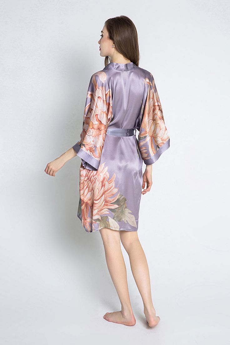 This short silk kimono robe is a luxurious, handcrafted piece of art you can wear. Removable waist tie closure Belt loops and inside ties to secure closure French seam finish Side slits at hem 100% Silk, Dry clean Designed in San Francisco, Imported KM04S Every day is a little more beautiful in this luxurious, breathably soft, one of a kind watercolor robe. Each piece features an original pattern — first sketched by hand, then saturated in rich watercolors using a traditional paintbrush — so jus Silk Kimono With Tie Waist For Spring, Silk Spring Kimono With Tie Waist, Spring Silk Kimono With Tie Waist, Silk Robe With Tie Waist For Spring, Silk Wrap Robe With Tie Waist, Spring Silk Robe With Tie Waist, Elegant Kimono With Tie Waist And Kimono Sleeves, Elegant Silk Belted Kimono, Elegant Belted Kimono With Kimono Sleeves