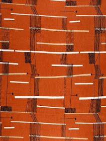 an orange fabric with white and black lines on it