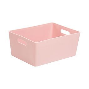 a pink storage bin with handles on the front and bottom, sitting against a white background