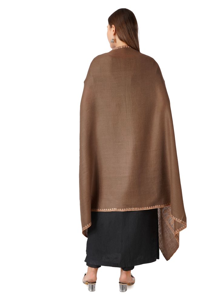 Experience sophistication with our Traditional Pashmina Shawl, intricately designed to exude classic beauty. Created from pure Kashmiri pashmina in a rich brown shade, this shawl epitomizes luxurious comfort and timeless allure. Product Details: Hand Embroidered Pure Kashmiri Pashmina Shawl Material: Pure Pashmina (100% Cashmere) Size: 100 cm X 203 cm / 40 Inch X 80 Inch / 1.1 x 2.2 Yards (Approx) Base Color: Brown Embroidery: Delicate and detailed border embroidery Sourced From: Changthangi goa Brown Embroidery, Brown Shade, Border Embroidery, Wool Wrap, Classic Brown, Brown Shades, Pashmina Shawl, Formal Outfit, Elegant Accessories