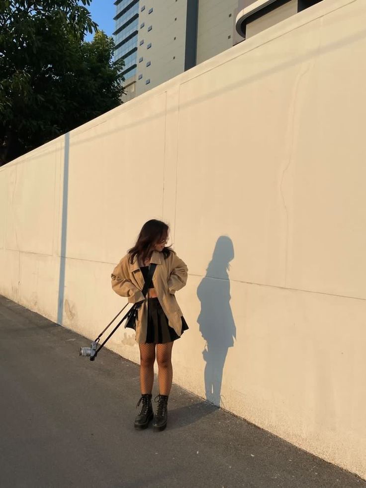 beige oversized jacket black pleated skirt fishnet stockings combat boots aesthetic outfit Pleated Skirt With Combat Boots, Combat Boots Aesthetic Outfit, Beige Combat Boots Outfit, Boots Aesthetic Outfit, Skirt With Combat Boots, Combat Boots Aesthetic, Fishnet Outfits, Stockings And Skirt, Fishnet Outfit