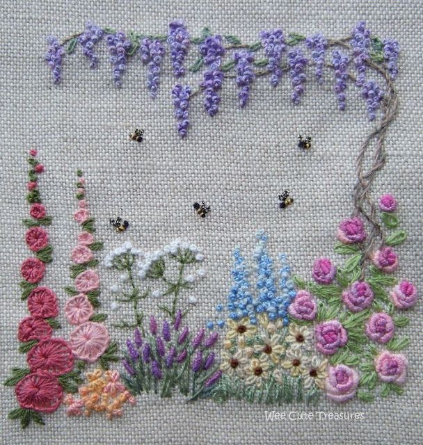 a cross stitch pattern with flowers on it