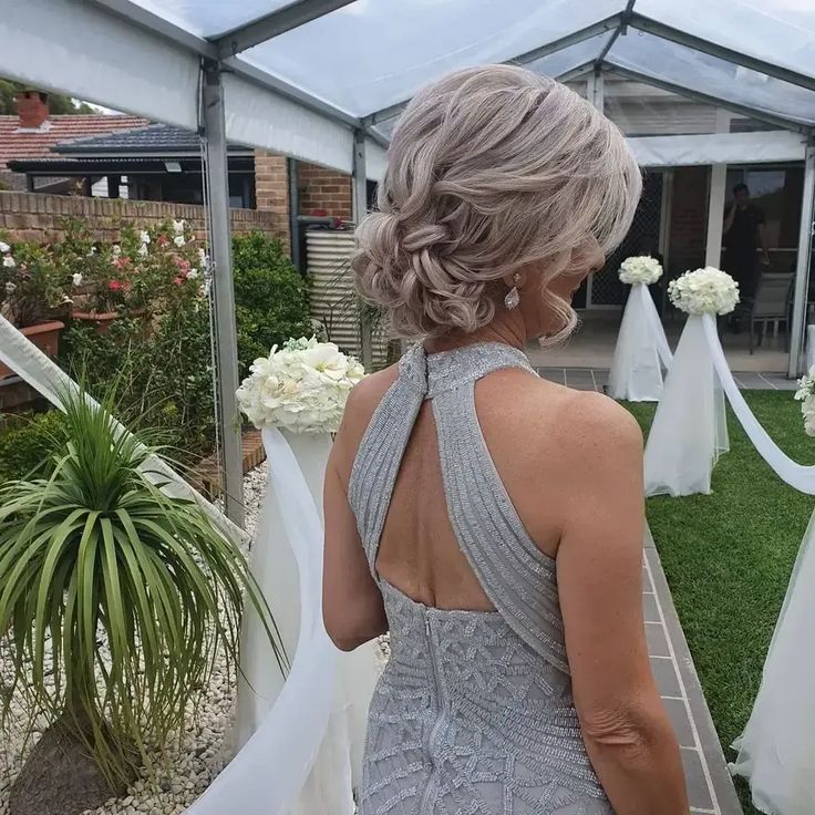 the back of a woman in a gray dress