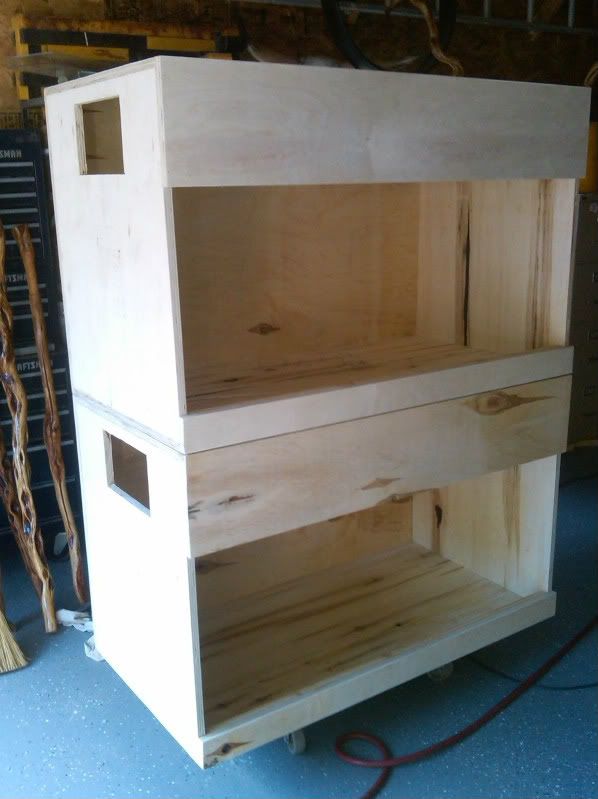 the shelves are made out of wood and ready to be built into some kind of cabinet