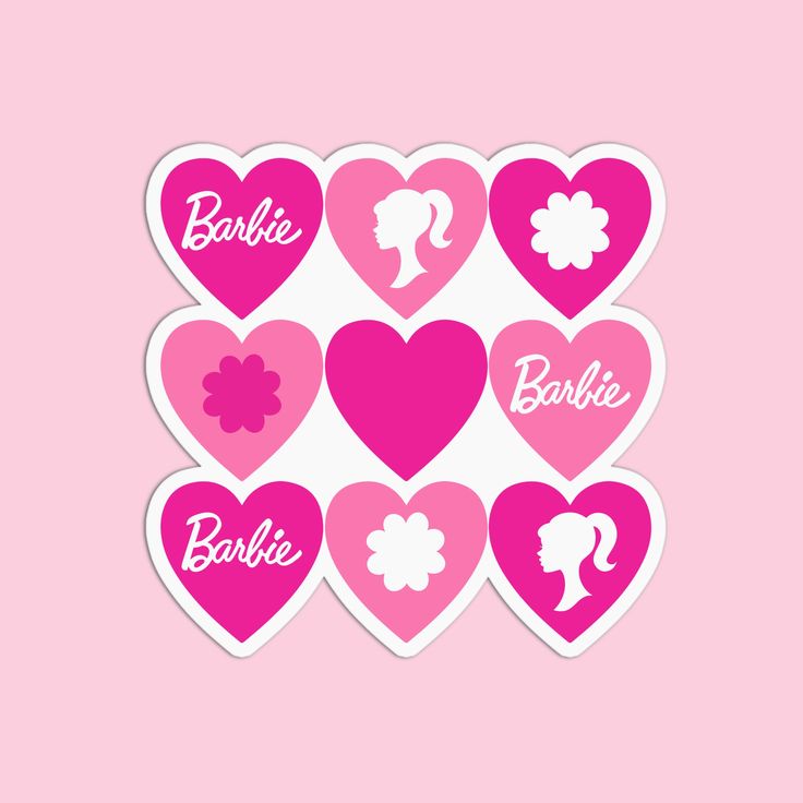 pink and white heart shaped stickers with the word barbie on them