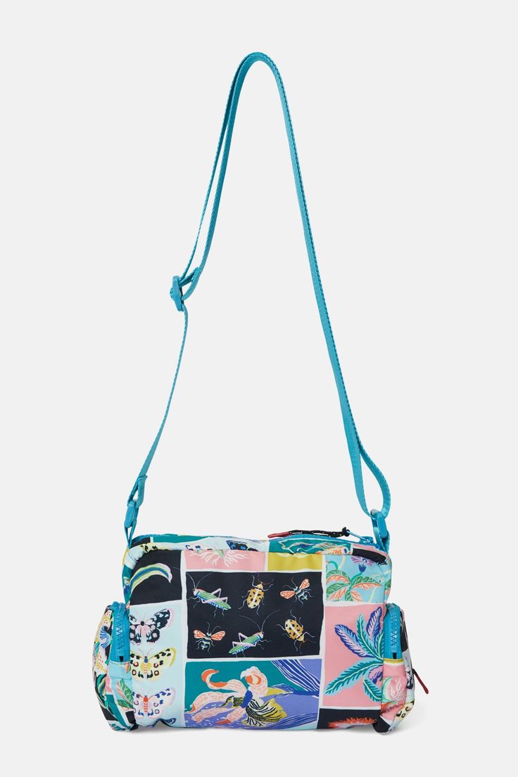 Printed Cross Body Bag- water resistant- measures 22cm L x 16cm H x 8cm D- includes a front pocket 8cm in H- 2x side pcokets measureing 10cm H- includes an inside pocket- adjustable shoulder strap- features Sarah Gordon x gorman exclusive design- print placement may vary Product Code: GWFX133 Sarah Gordon, Print Placement, Printed Bags, Body Bag, Exclusive Designs, Inside Pocket, Front Pocket, Cross Body, Crossbody Bag