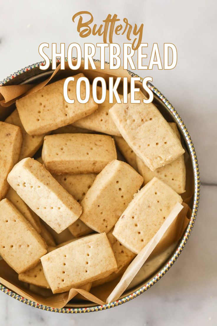 a bowl filled with shortbread cookies on top of a table