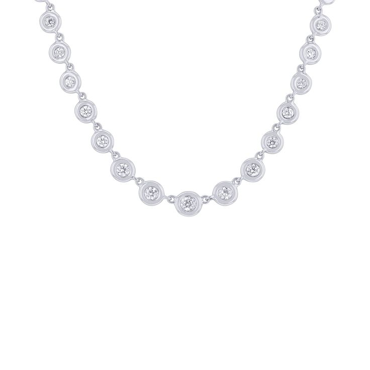 Indulge in elegance with this sophisticated Ethereum necklace. Crafted from 14 karat white gold with a bezel style graduated design, this exquisite piece features 3/5 carats total weight of sparkling diamonds. Experience luxury with this stunning and exclusive piece. Classic Diamond White Necklace With Bezel Setting, Classic White Gold Diamond Necklace With Bezel Setting, White Gold Diamond Necklace With Bezel Setting, White Gold Platinum Necklace With Bezel Setting, Silver Diamond Necklace With Bezel Setting In Round Cut, Silver Diamond Necklace With Round Cut In Bezel Setting, Classic Platinum Diamond Necklace With Bezel Setting, Platinum Diamond Necklace With Bezel Setting For Anniversary, Classic Platinum Necklace With Bezel Setting