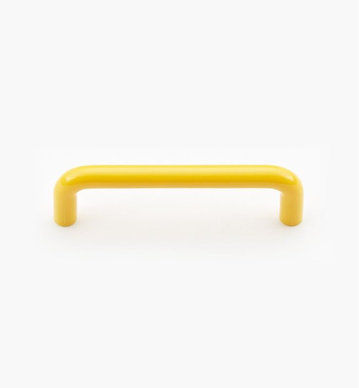 a yellow handle on a white background