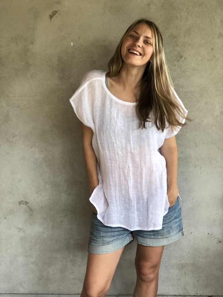 "This is a lovely, light weight gauze linen top, that is meant to be loose and comfortable. Perfect for hot days when all you want to feel is a soft breeze against your skin. Made from 100% pure linen gauze. It is somewhat see through and might require a slip underneath. Each piece is individually cut, sawn and pre-washed. See standard sizing below. We really love making various sizes - from petit to plus size and more. For the best fitting of this shirt please let us know the following measurem Breezy Relaxed Fit Top For Vacation, Breezy Relaxed Fit Vacation Tops, Bohemian Linen Tops For Summer, Bohemian Linen Summer Tops, Summer Bohemian Linen Tops, Relaxed White Linen Blouse, Flowy Linen Tops For Beach, Bohemian Cotton Gauze Top For Beach, Summer Beach Blouse Made Of Ramie