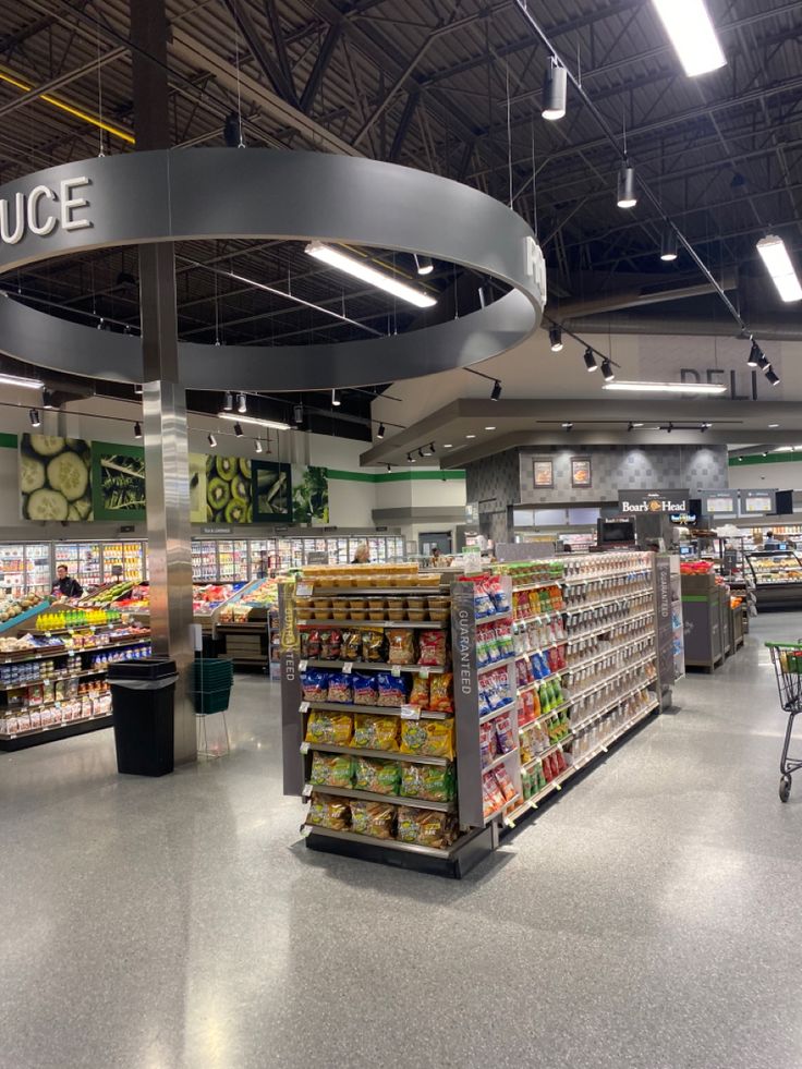 an empty grocery store filled with lots of food