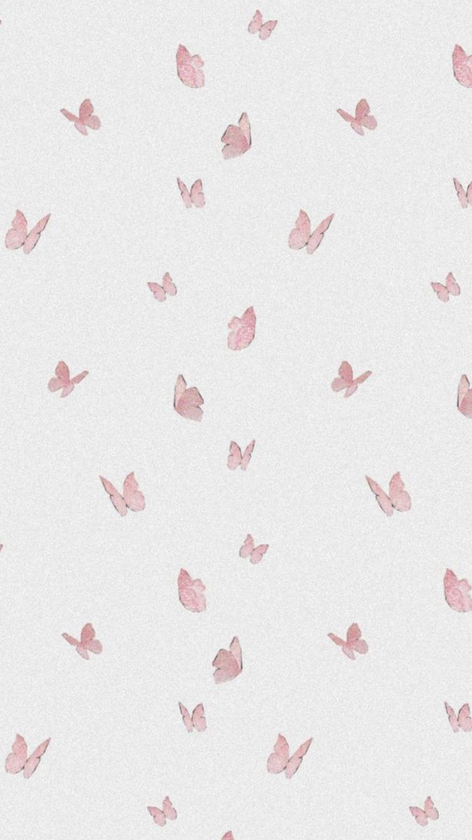 pink butterflies are flying in the air on a white background with light pink spots and shadows