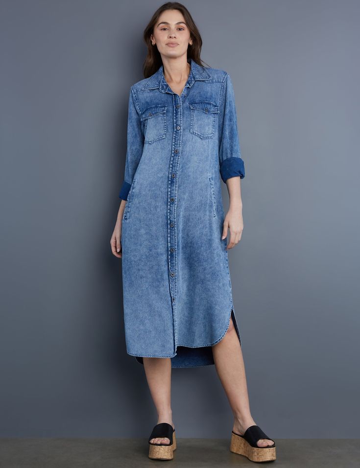 Our impossibly soft premium denim, full button-front and sleeves, and high-low hem highlight this gorgeous midi Pocket Shirtdress. The model is 5'7" wearing size small Fabric: 65% Cotton 35% Lyocell Length: 44" from shoulder Relaxed Fit Shirttail Hem Dress For Fall, Relaxed Fit Denim Midi Dress, Fall Shirttail Hem Relaxed Fit Dress, Fall Dresses With Relaxed Fit And Shirttail Hem, Denim Midi Dress With Relaxed Fit, Casual Fall Dresses With Shirttail Hem, Medium Wash Button-up Dress For Daywear, Casual High-low Hem Shirt Dress For Spring, Casual Denim Midi Dress With Relaxed Fit