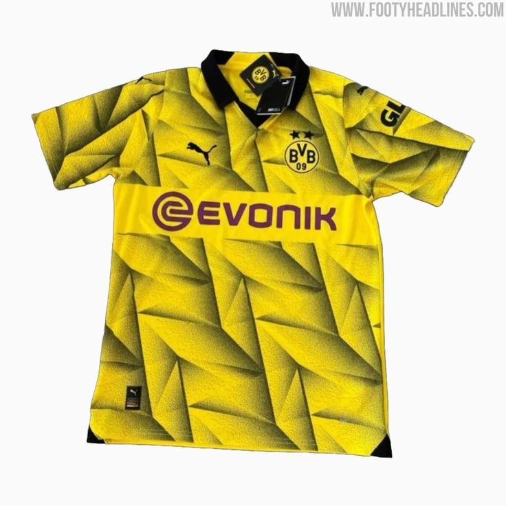 a yellow soccer jersey with the word evonik on it