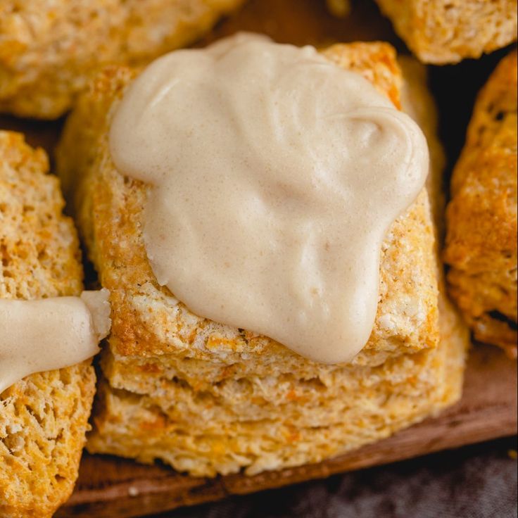 biscuits with icing sitting on top of each other