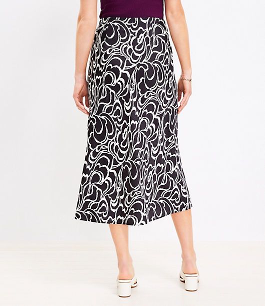 With a comfy pull-on waist, this flowy midi skirt is an irresistibly effortless dose of romance for your routine. Elasticized waist.,Hit:Hit: Midi - Hits at mid-calf,Imported:Imported,Length:34" long,Fabrication:100% Polyester,Garment Care:Machine washable Loft Bloom Bias Midi Skirt Size XS Black Women's by Loft Size Regular - XS Black Women's Midi, Skirts, 100%, Polyester, Machine, washable Flowy Midi Length Bottoms For Day Out, Flattering Spring Flowy Skirt, Flattering Flowy Bottoms For Spring, Flattering Flowy Skirt For Spring, Flattering Spring Midi Skirt, Flattering Black Skirt For Spring, Flowy Black Midi Skirt, Loft Store, Flowy Midi Skirt