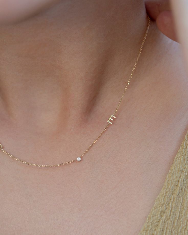 Personalized Asymmetrical 14k solid gold initials necklace with small diamond bezel. Simple, minimalist everyday necklace Perfect wearing alone or layering with your favorite necklaces. * Letter measures approx. 4.8mm * Material: Available in 14K Yellow Gold or 14K White Gold * Diamond: 0.03ct. VS Clarity F-H color * Leave us your initial and placement in the comment box at checkout. White Gold Initial Necklace, Necklace With Small Diamonds, Necklace With Initials Letters, Dainty Gold Initial Necklace, Necklaces With Initials, Gold Necklace With Initials, Tiny Initial Necklace, Gold Letter Necklace Initials, Diamond Letter Necklace