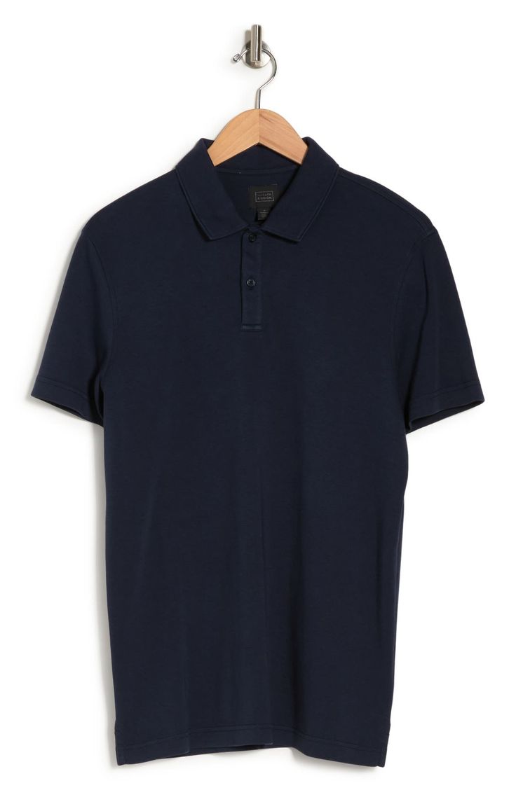 A solid cotton polo brings polished style with everyday comfort. 29" length (size Medium) Spread collar Short sleeves Machine wash, tumble dry 100% cotton Imported Navy Cotton Polo Shirt With Ribbed Collar, Navy Fitted Cotton Polo Shirt, Cotton Polo Shirt With Collared Neckline, Collared Cotton Polo Shirt With Placket, Navy Cotton Polo Shirt With Button Closure, Classic Navy Cotton Polo Shirt, Navy Cotton Polo Shirt With Placket, Basic Cotton Polo Shirt With Collared Neckline, Basic Cotton Polo Shirt