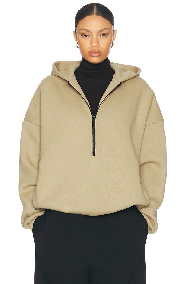 Self: 69% cotton 31% polyester, Pocket Lining: 100% cotton.  Made in Portugal.  Machine wash.  Partial front zipper closure.  Attached hood.  Side seam pockets.  Attached hood.  Fleece lining.  .  .  .  .  .  .  .  . Winter Athleisure Hoodie With Zipper Closure, Winter Half-zip Hoodie With Double-lined Hood, Winter Half-zip Sweatshirt With Double-lined Hood, Oversized Hooded Hoodie With Zipper Closure, Oversized Hooded Hoodie With Zipper, Oversized Hooded Zipper Hoodie, Fall Half-zip Hoodie With Drawstring, Fall Half-zip Hoodie With Double-lined Hood, Oversized Fleece Hoodie With Half-zip