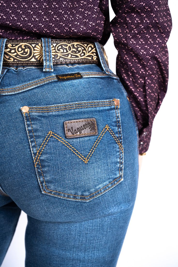 WOMEN PRO-RODEO DENIM JEANS BLUE | Genuine Leather Vaquero Boots and Cowboy Hats | Zapateria Guadalajara | Authentic Mexican Western Wear Western Denim Blue Jeans With Pockets, Western Style Denim Blue Jeans With Pockets, Western Style Jeans With Pockets In Denim Blue, Fitted Dark Wash Western Jeans, Fitted Western Dark Wash Jeans, Fitted Western Style Dark Wash Jeans, Western Mid-rise Bottoms With Five Pockets, Western High Rise Fitted Flare Jeans, Fitted High Rise Western Flare Jeans