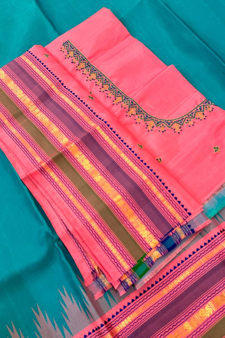 Expertly handcrafted with traditional korvai technique, the Kanjivaram Silk Saree boasts a luxurious turquoise blue body and stunning pink border and pallu. With intricate grand threadwork, this saree exudes elegance and sophistication. Elevate your wardrobe with this timeless and exquisite piece of Indian heritage. The blouse piece is elegantly hand embroidered to match the saree. Approximate Length 6.5 mtrs (inclusive of blouse length) Approximate Height - 46 - 48" Approximate weight - 1.5 lbs Saree comes with fall, picot and tassels done when applicable. Blouse piece is cut. Kindly Note : The colors you see on your device may vary due to the color reproduction, brightness and resolution of individual devices. If you'd like more clarity before your purchase, please contact our support te Pink Border, Kanjivaram Silk Saree, Silk Cotton Sarees, Indian Heritage, Cotton Sarees, Blouse Length, Cotton Saree, Blouse Piece, Turquoise Blue