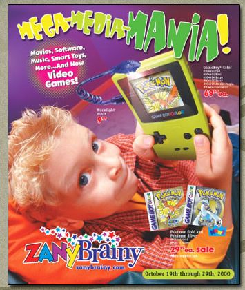 a magazine cover with a young boy holding an electronic device