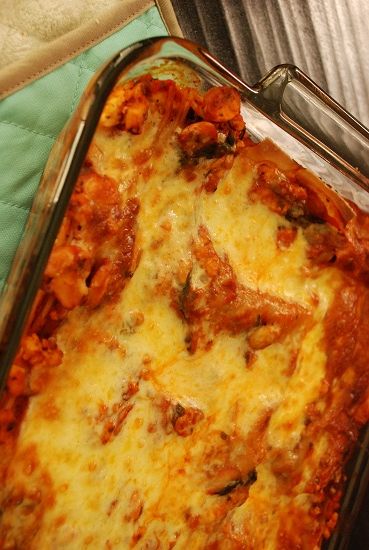 a casserole dish filled with meat and cheese