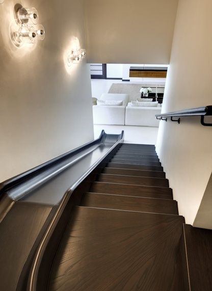 an escalator leading up to a living room