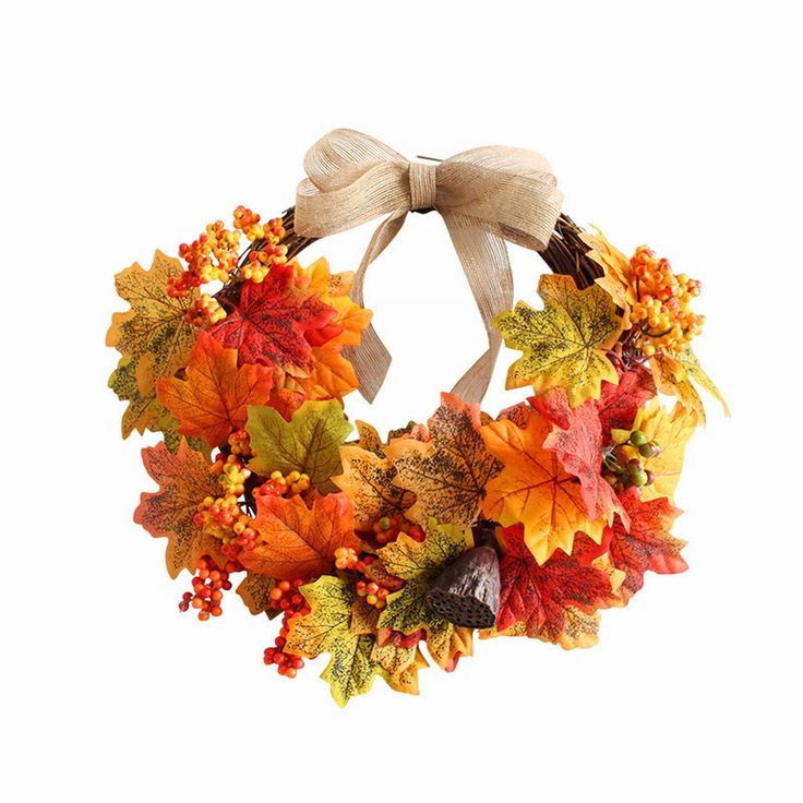 an autumn wreath with leaves and berries