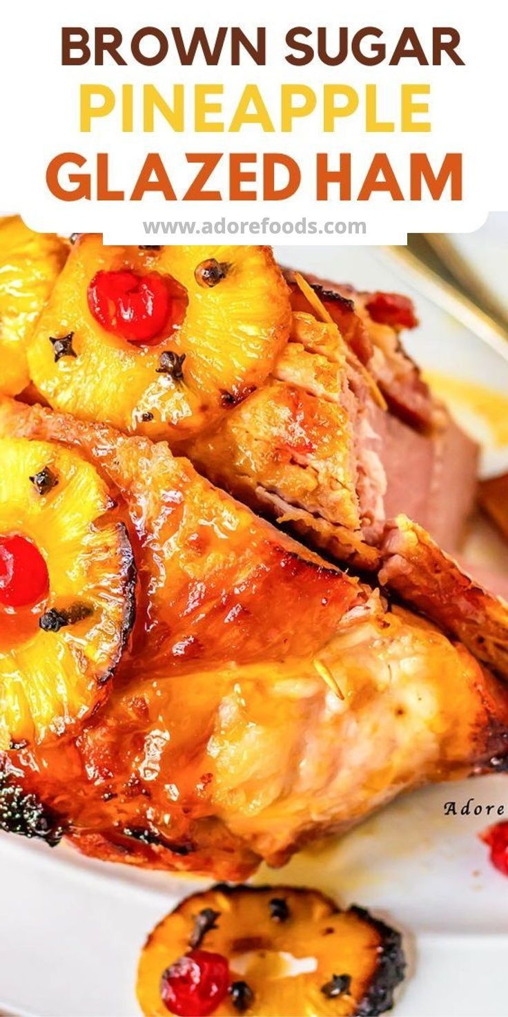 a close up of a plate of food with pineapple glazed ham