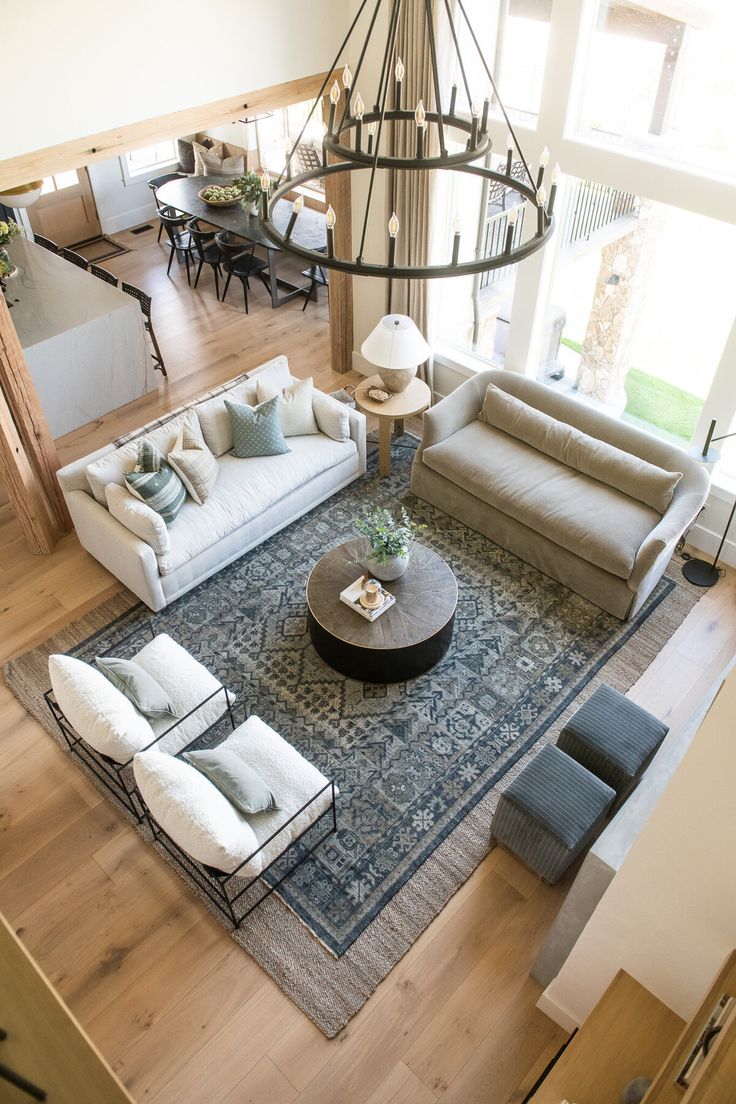 an overhead view of a living room with couches and chairs